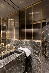 Bathroom interior black and gold