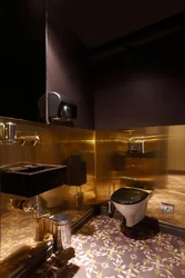 Bathroom interior black and gold