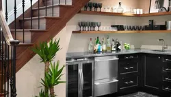 If the stairs are in the kitchen photo