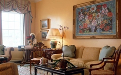 Painting in the interior of the living room photo in a city apartment