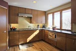 Modern kitchen design with a window in the middle