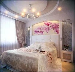 Photo Of A Bedroom With A Flower Above The Bed