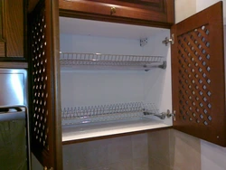 Cupboard dish dryer for the kitchen photo