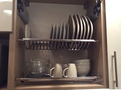 Cupboard dish dryer for the kitchen photo