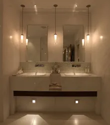 Mirrors in a small bathroom photo