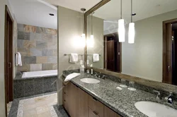 Mirrors in a small bathroom photo