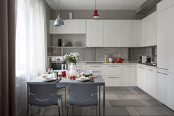 Kitchen interior in a house in gray tones