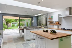 House projects with access to the terrace from the kitchen photo