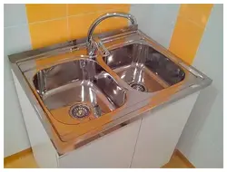 Overhead kitchen sink with cabinet photo