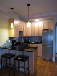 Photo of a 12 square meter kitchen with a bar counter