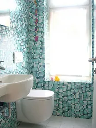 Bathroom design for small bathtub with mosaic tiles