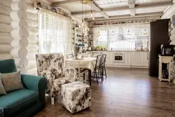 Living room interior with kitchen in wooden style