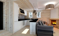 Living room interior with kitchen in wooden style