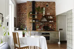 Brick kitchen in apartment photo