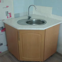 Corner kitchen sink with cabinet photo