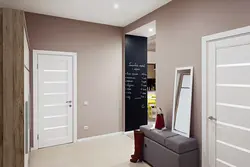 Doors of different colors in the interior of the apartment