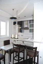 Kitchen design 9 sq m with a bar counter