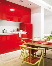 Photo of interiors of red kitchen apartments