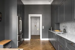 Gray kitchen in the interior combination with the floor