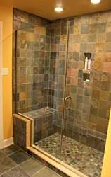 Shower cabin made of tiles design in the apartment