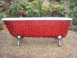 Cast iron bathtub in the countryside photo