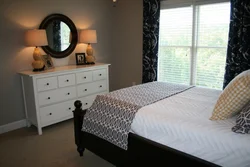Bedroom interior chest of drawers bed