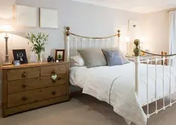 Bedroom interior chest of drawers bed