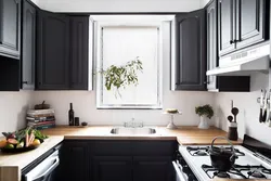 Kitchen design with dark window