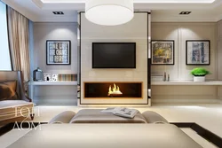 Bedroom with fireplace and TV photo