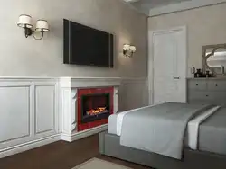 Kamin və TV fotoşəkili olan yataq otağı