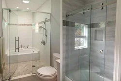 Photo Of A Bathroom With A Shower Behind Glass