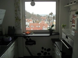 Photo of a kitchen in Khrushchev with a window sill table