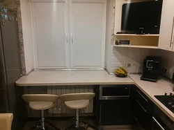 Photo of a kitchen in Khrushchev with a window sill table