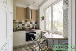 Photo of a kitchen in Khrushchev with a window sill table