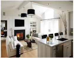 Living room kitchen design with fireplace 20 sq.m.
