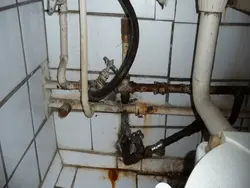 Photos of pipes in the bathroom