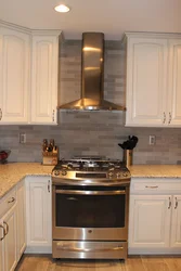 Kitchen with a regular gas stove photo