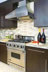 Kitchen with a regular gas stove photo