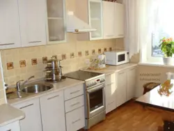 Kitchen with a regular gas stove photo