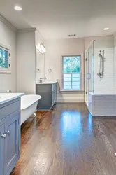 Bathroom design with wood floor