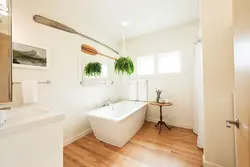 Bathroom design with wood floor