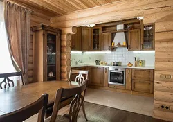 Kitchen design in a wooden house made of logs