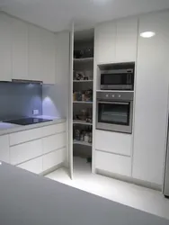 Kitchen design with built-in refrigerator and oven