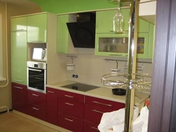 Kitchen Design With Built-In Refrigerator And Oven