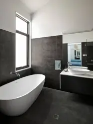 Bathroom design with dark floor