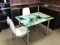 Photo of glass tables for the kitchen with a pattern
