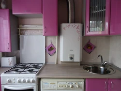 Kitchen design with corner sink and geyser