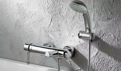 Faucet for bathtub and sink photo in the interior