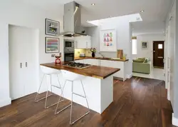 White kitchen living room interior with wood