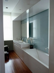 Bathtub And Sink On One Wall Photo